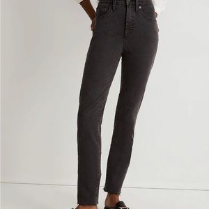 Madewell stovepipe jeans, black. Raw hem.